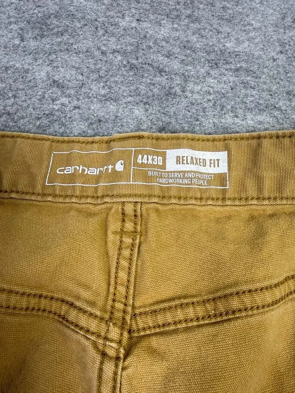 Carhartt Rugged Flex Canvas 5-Pocket Work Pant Size 44x30 Brown Relaxed Fit